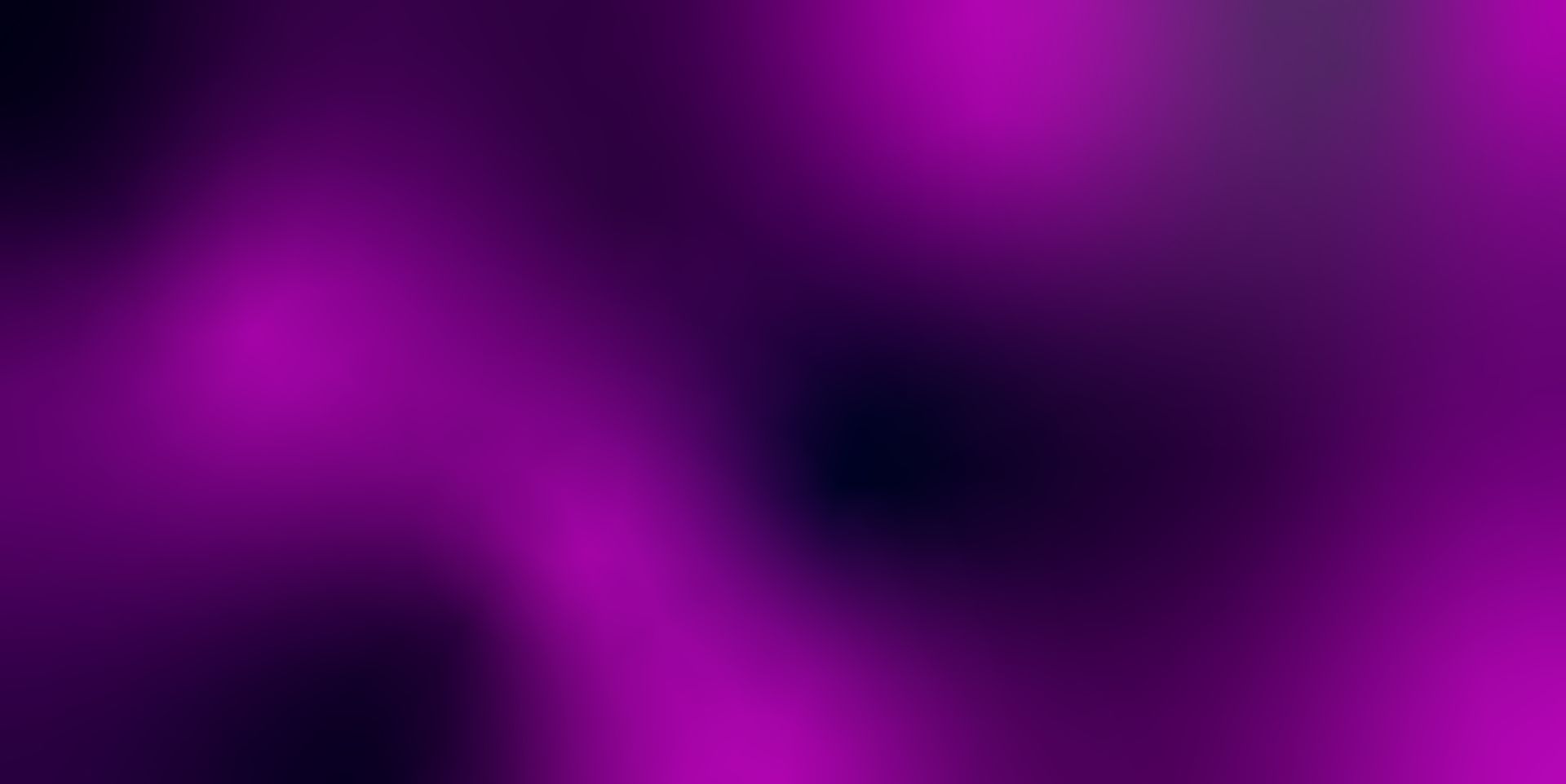 Unscharfe, violette Lichtflecken auf dunklem Hintergrund